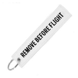 LLAVERO REMOVE BEFORE FLIIGHT BLANCO